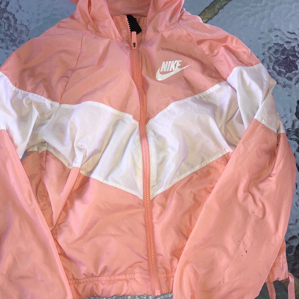 Pink Nike windbreaker .